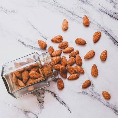 brown almond on white table